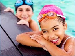 Blue Crush water polo team celebrating in the pool